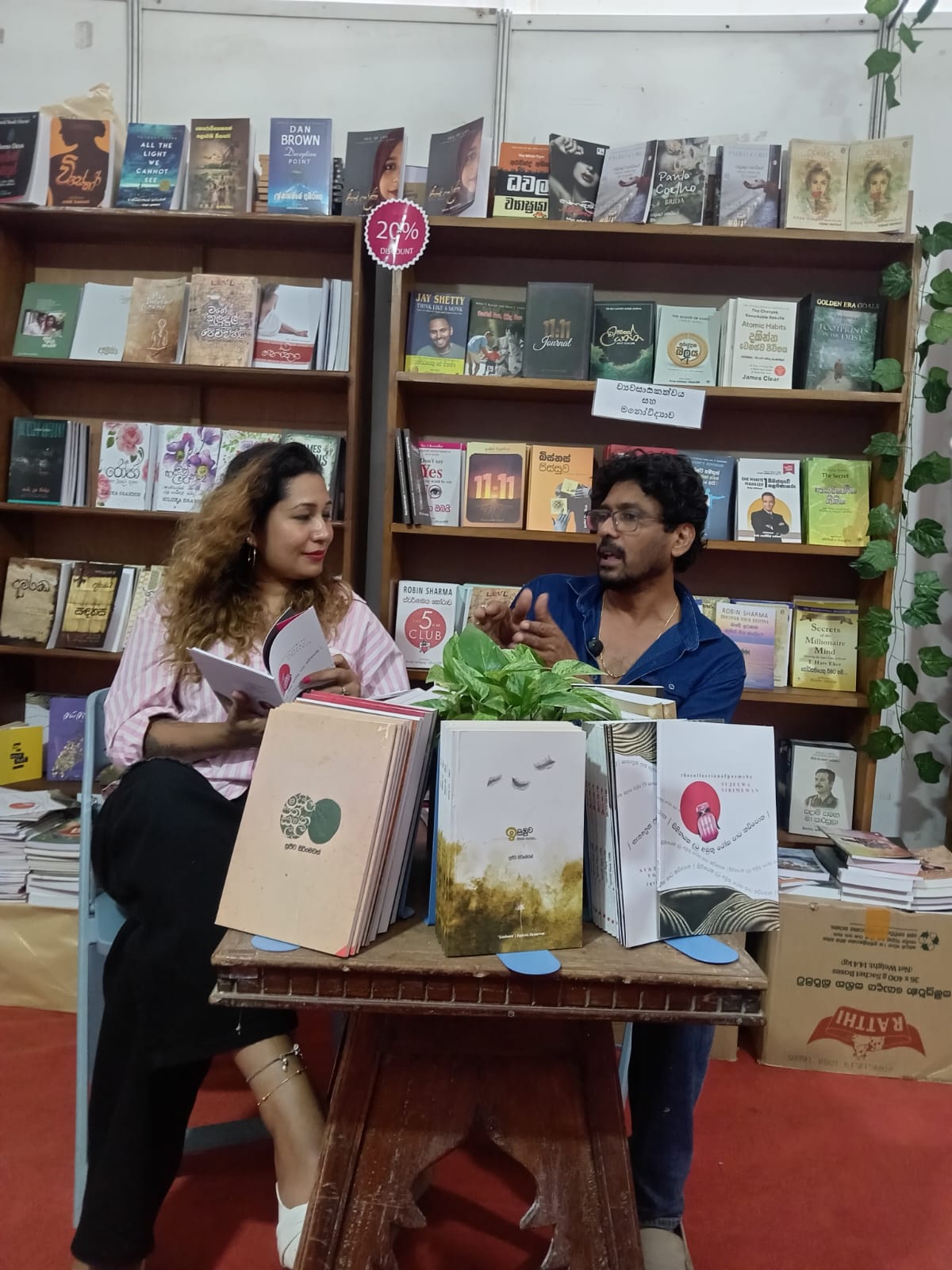 Readers sharing books at Silva Bookshop